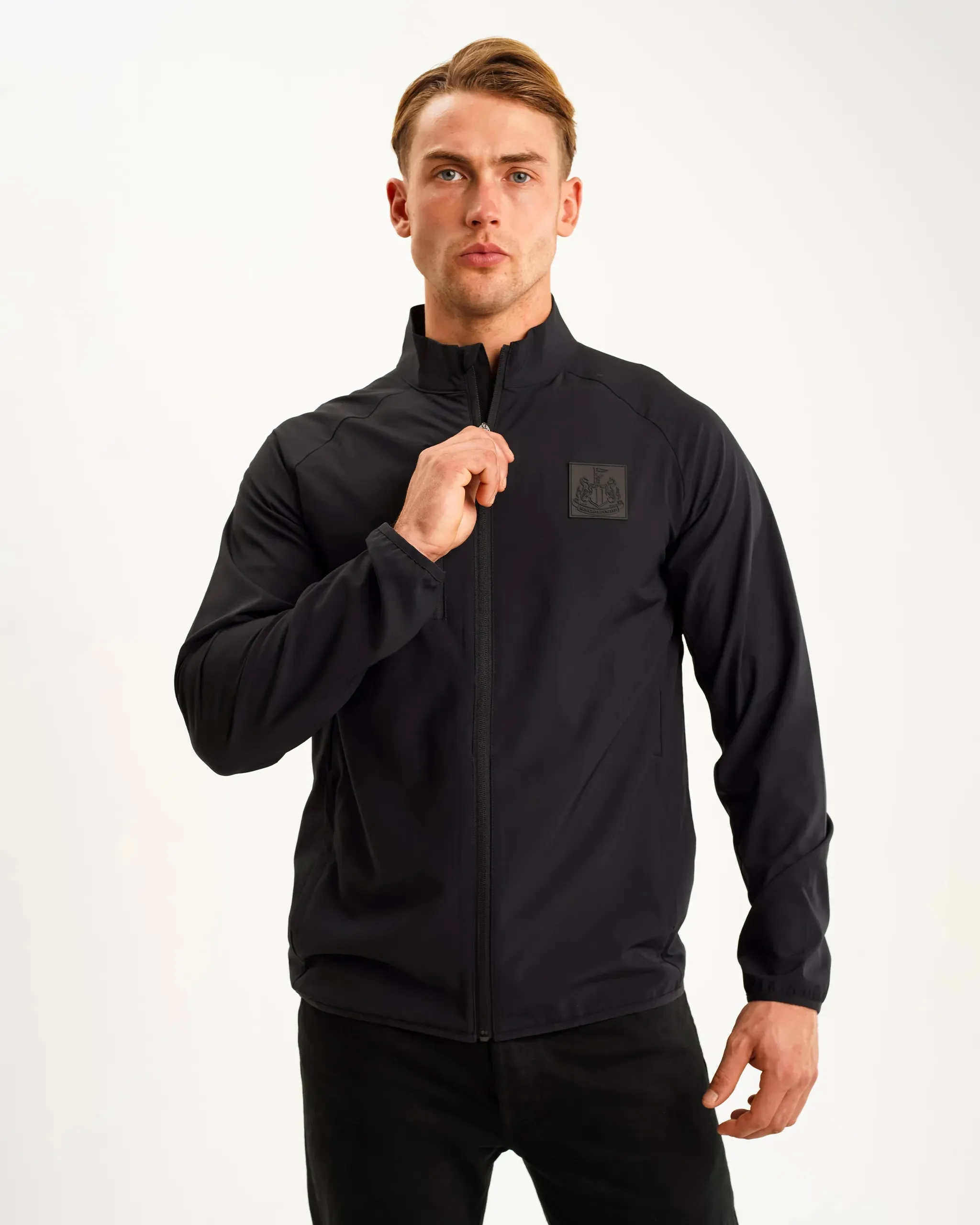 Newcastle United Men's Black Raglan Jacket Convertible Style