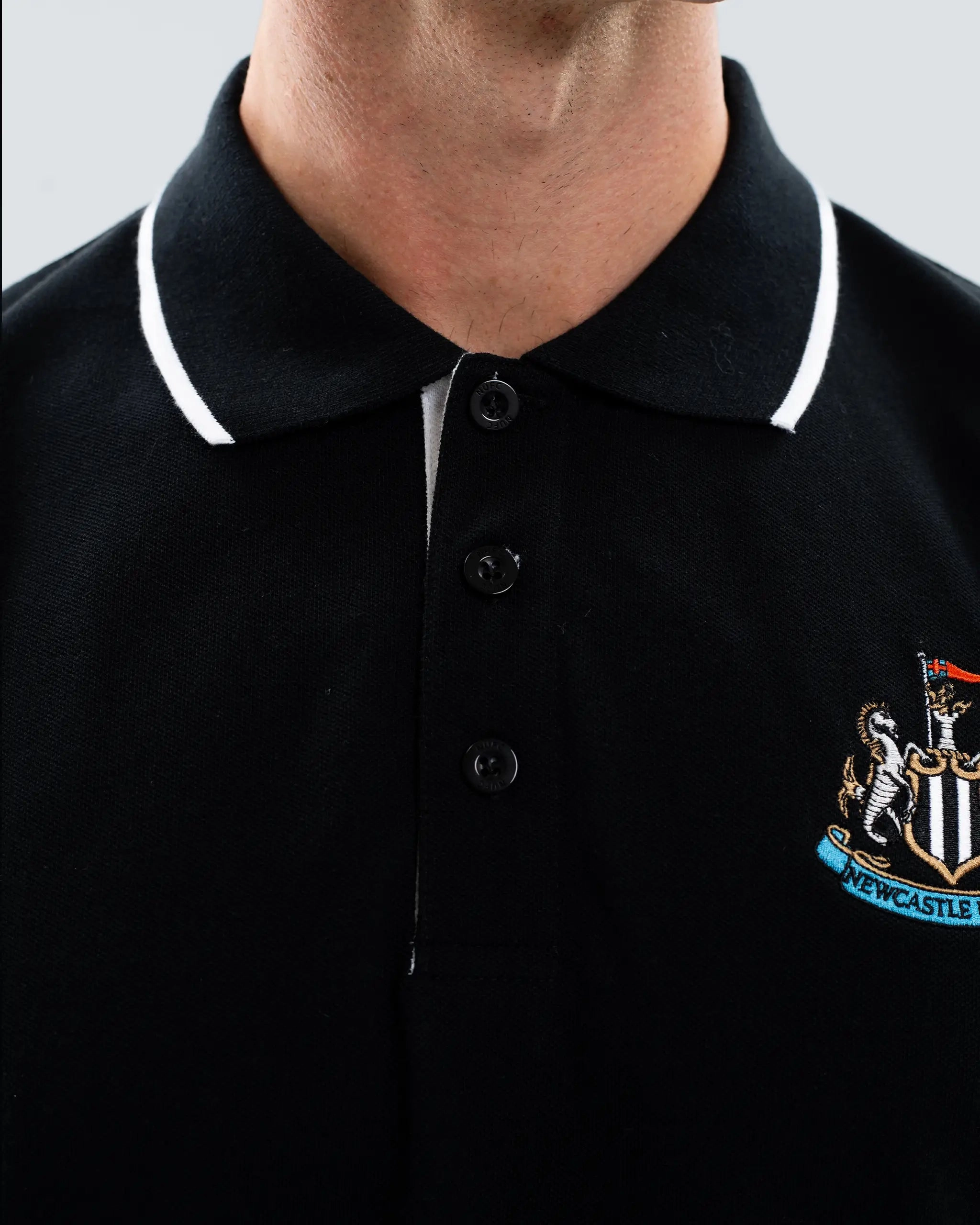 WrinkleResistant Finish Vibrant Style Newcastle United Men's Essentials Range Black Polo Shirt