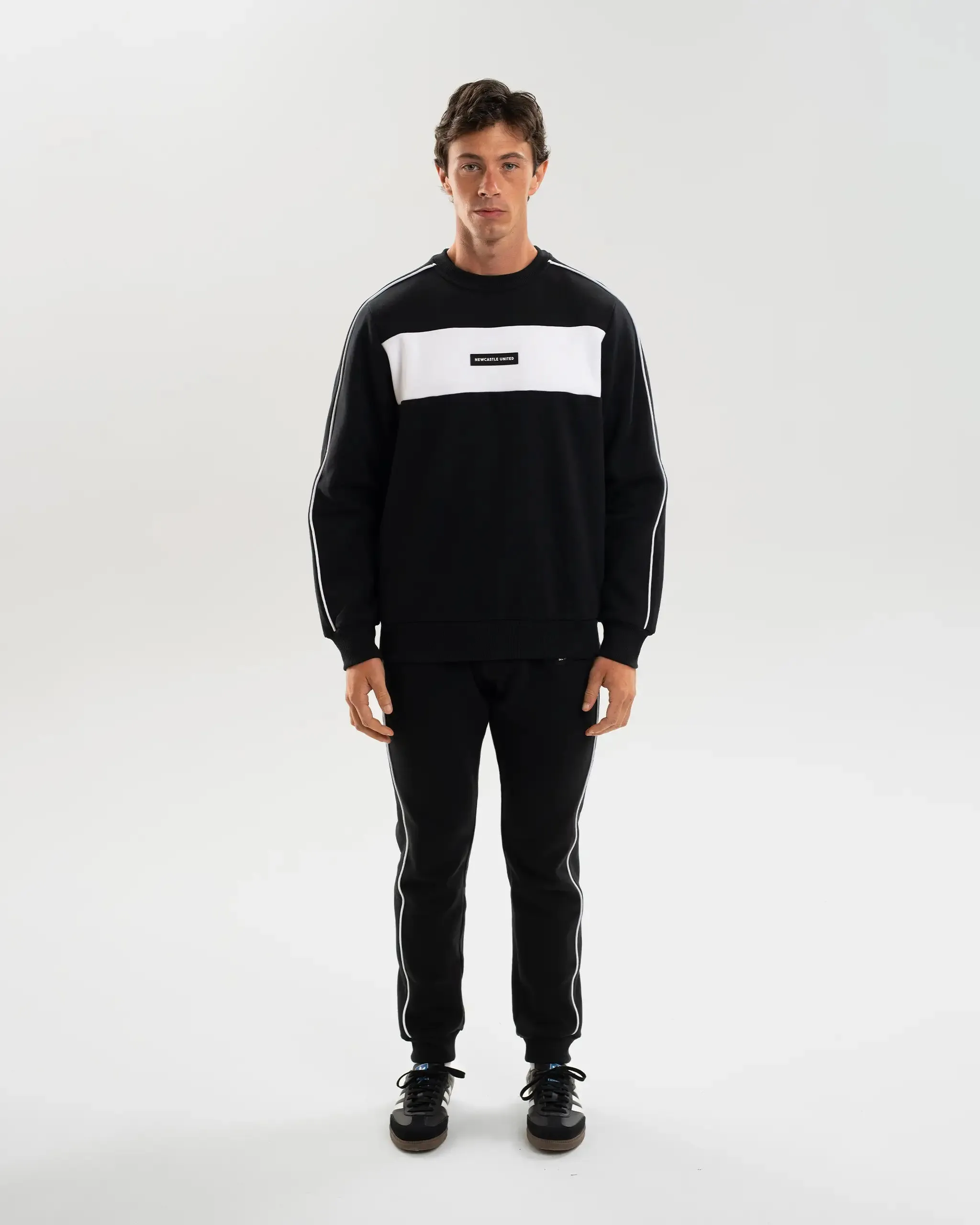 Newcastle United Men's Black Colour Block Sweatshirt Perfect for Layering Relaxed Cut