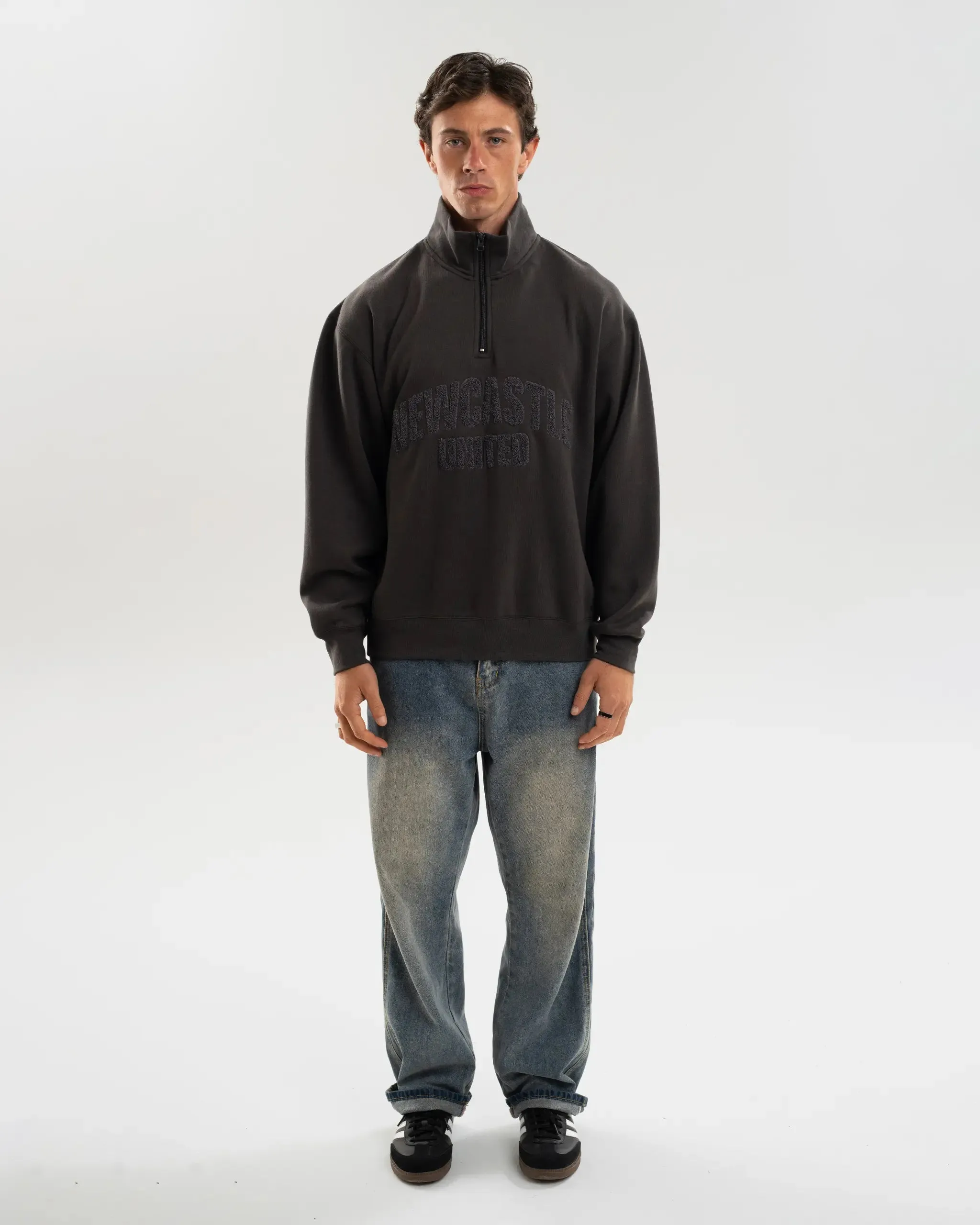 Fashion staples Newcastle United 1/4 Zip Tonal Sweater
