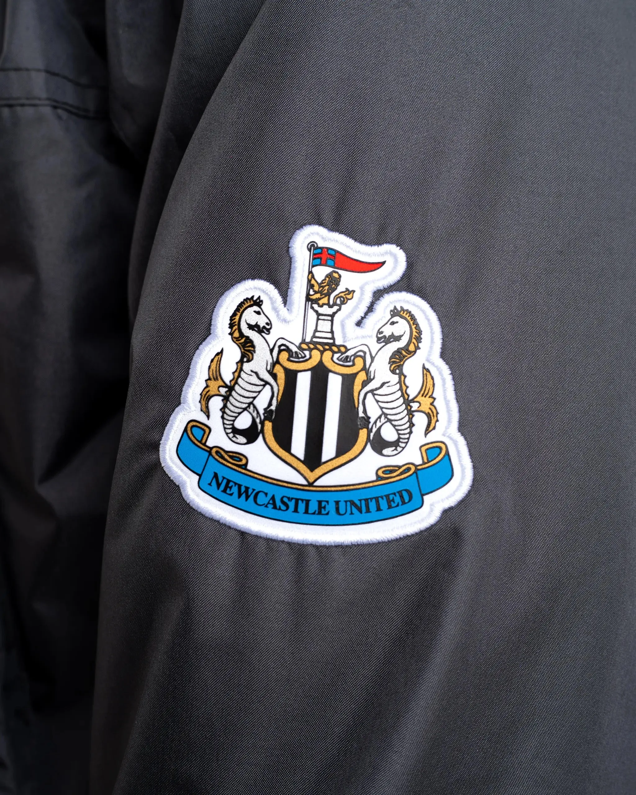 Newcastle United Men's Black Terrace Long Jacket Tear Resistant Knit Anytime Outer Fit