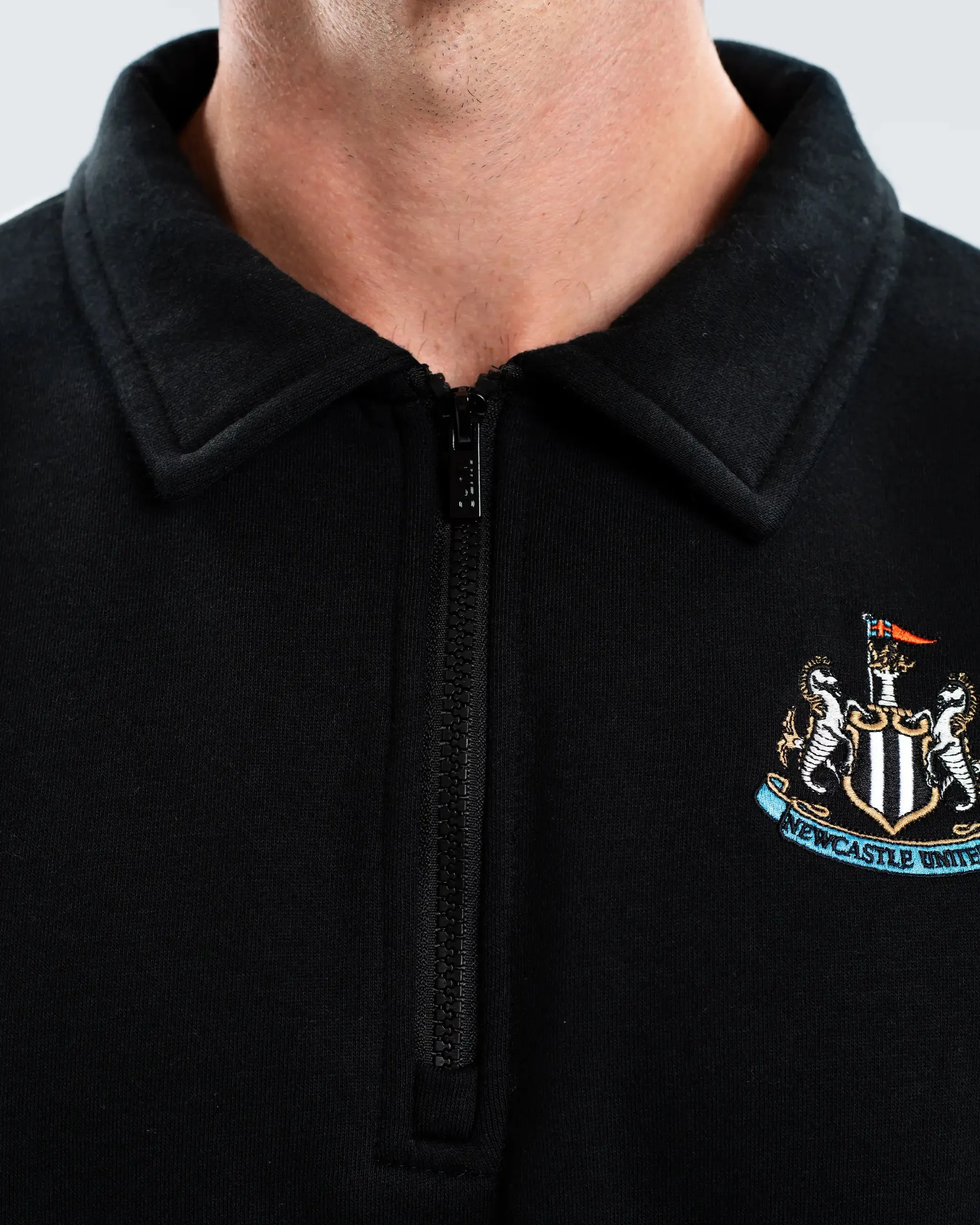 Long Lasting Elasticity Newcastle United Men's Essentials Range Black 1/4 Zip Sweater