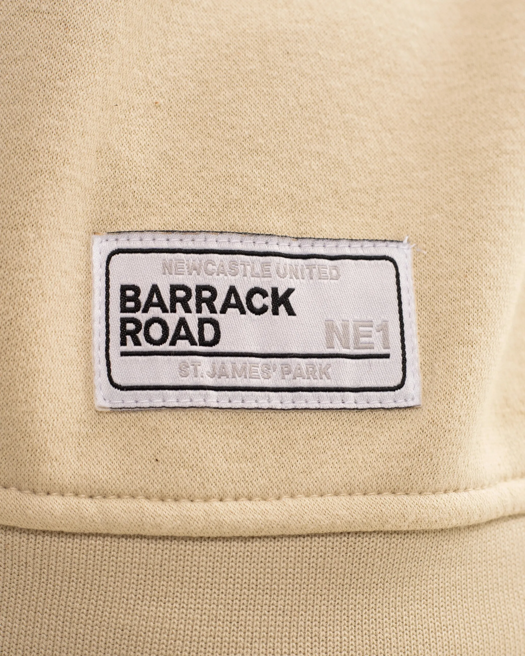Recycled Material Blend Soft Warmth Newcastle United St. James' Park Stone Graphic Collared Sweater