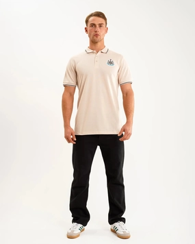 Relaxed Layers Newcastle United Men's Oat Terrace Pique Polo Shirt