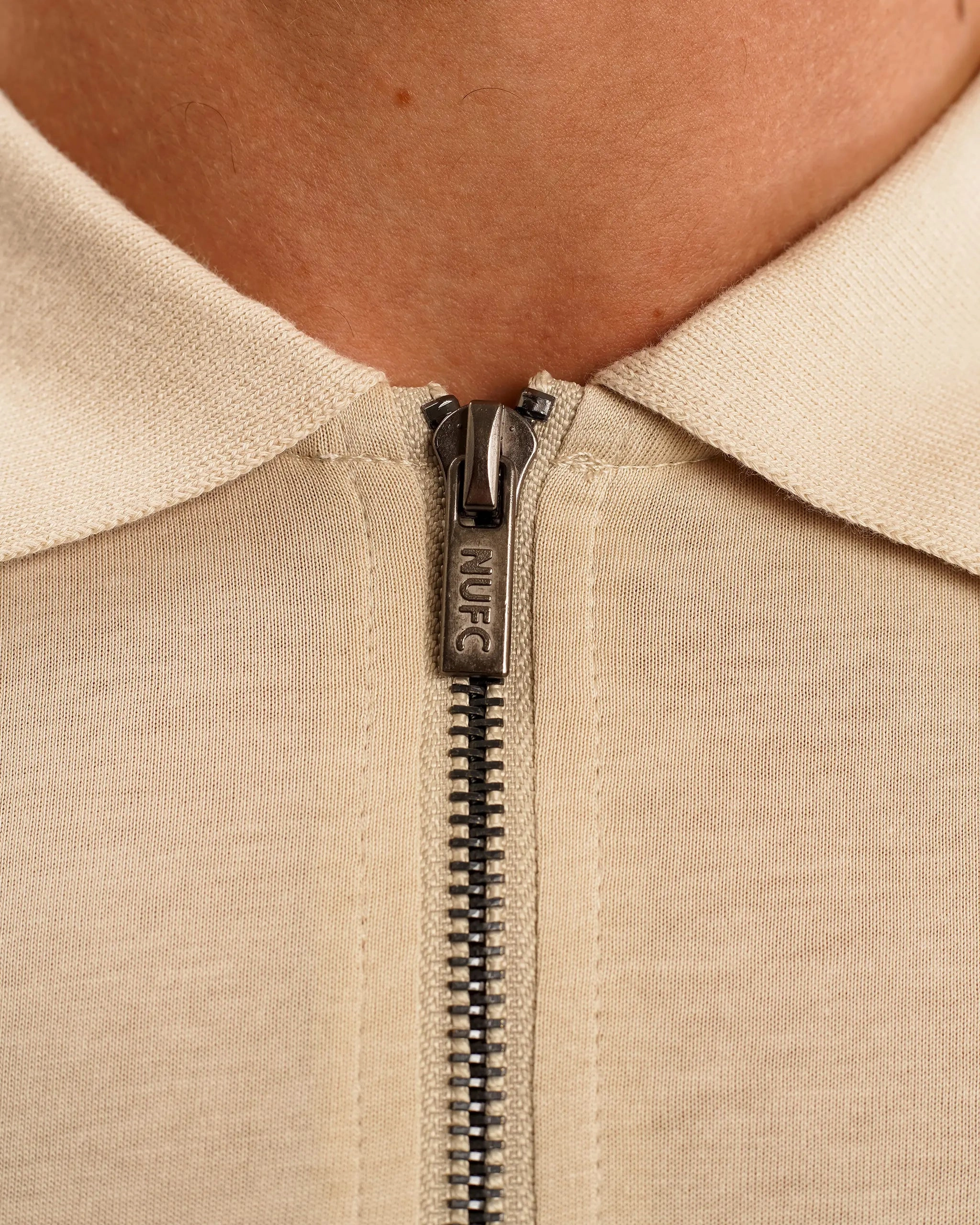 Newcastle United Men's Oat Zipped Polo Shirt Cozy Style Durable Comfort