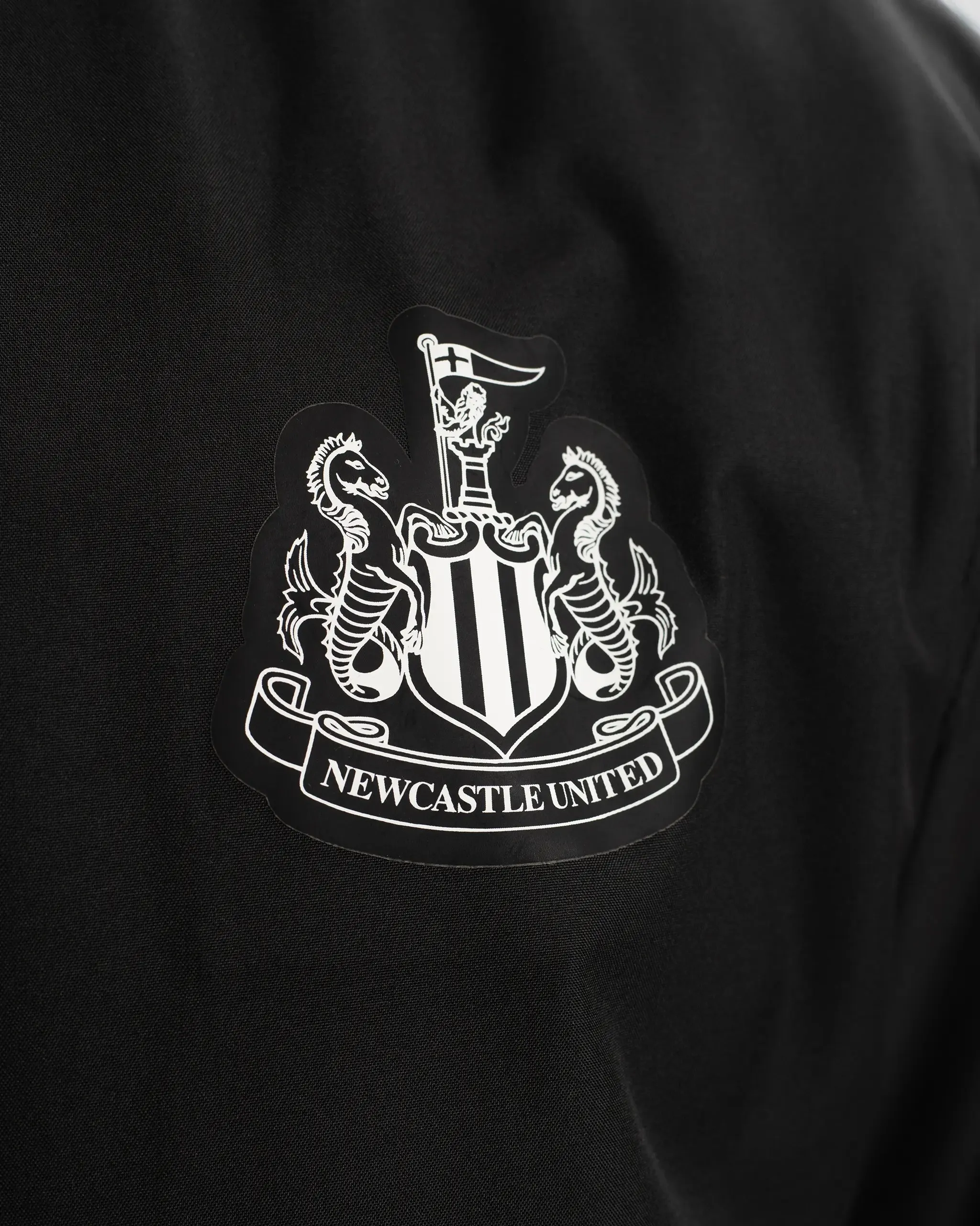 Newcastle United Men's Colour Block Shower Jacket Travel Ready Look Waterproof Technology