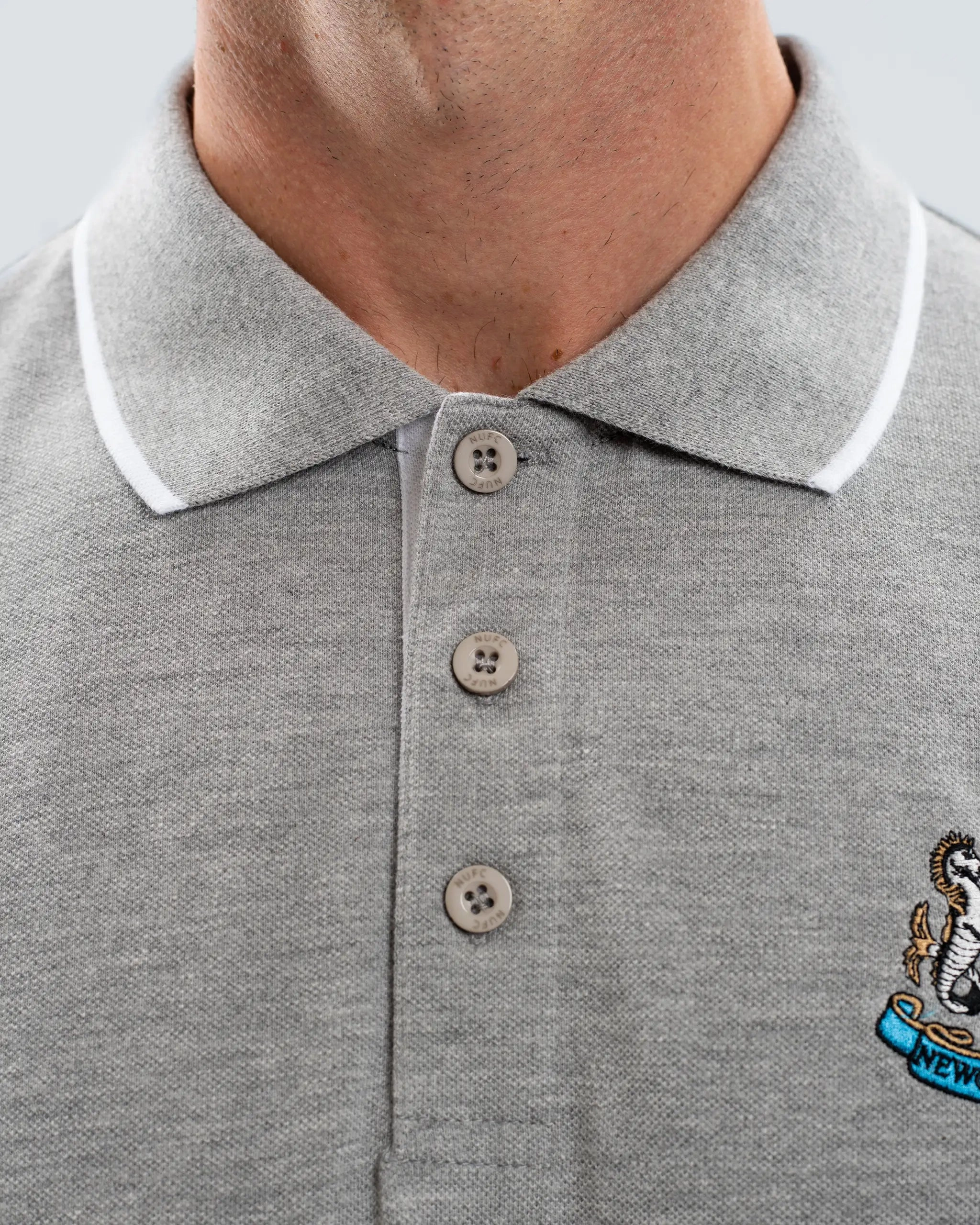 Comfortable Stretch Four Button Placket Newcastle United Men's Essentials Range Grey Polo Shirt