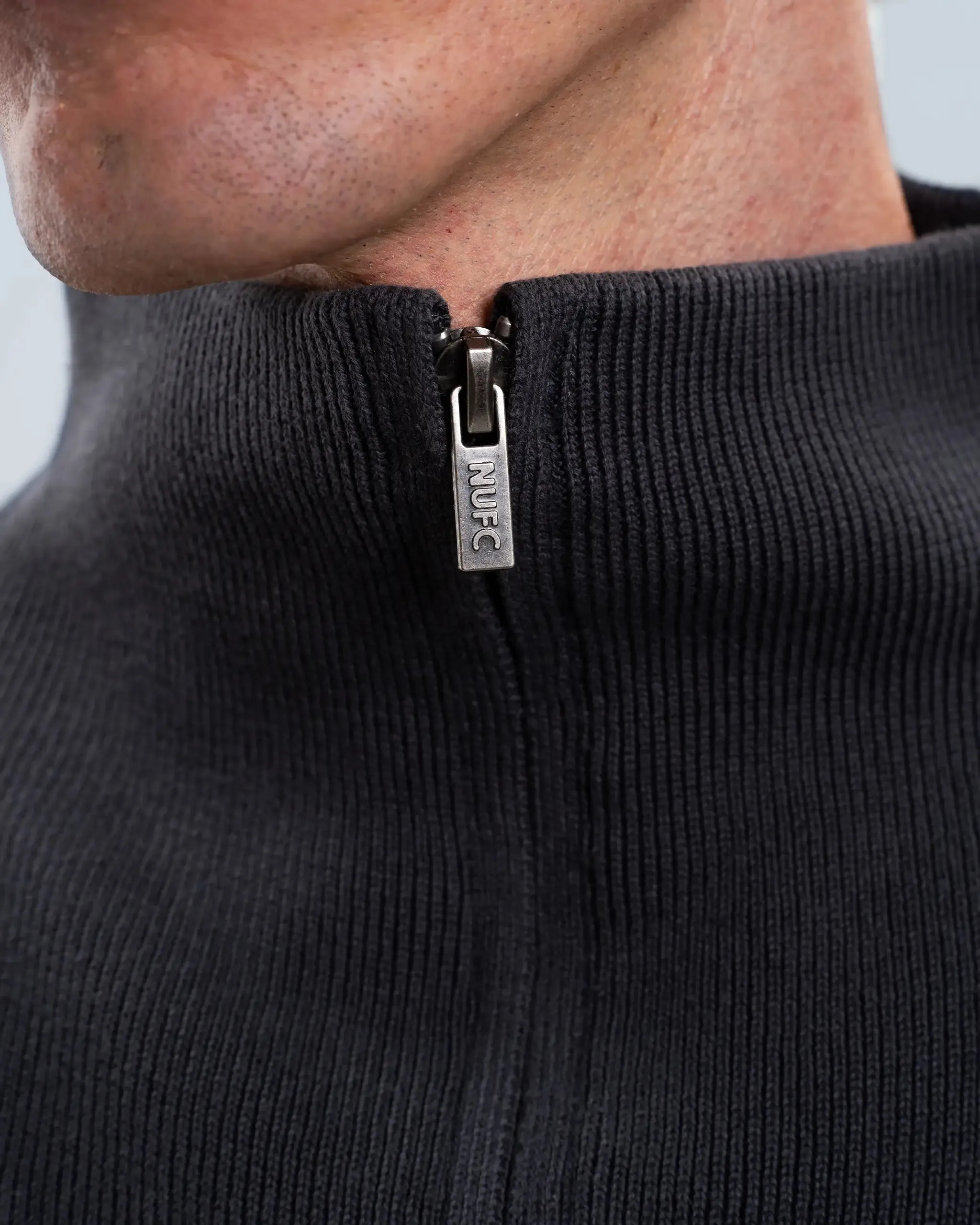 Comfortable knit piece Newcastle United Men's Charcoal Chunky Knit 1/4 Zip Top